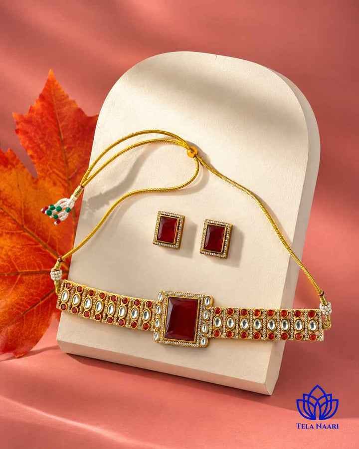 Fabric tie-up cord with tassels secures this choker set.