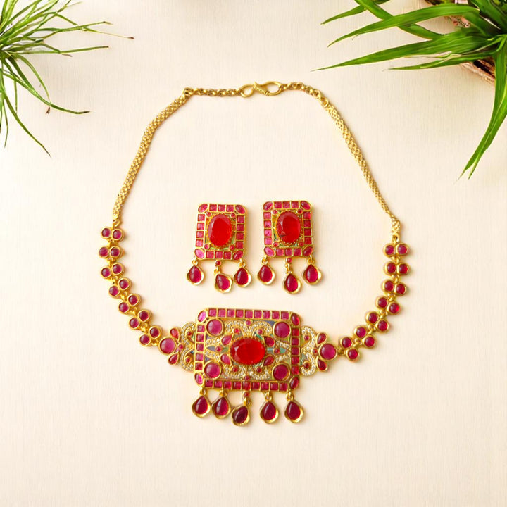 Kundan-style stone work decorates the surface of this necklace.
