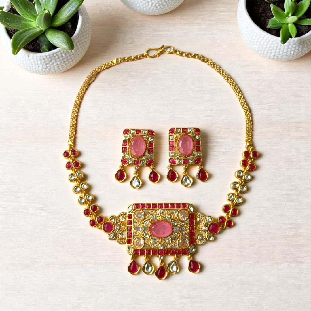 Hook clasp closure secures this vibrant brass necklace set.