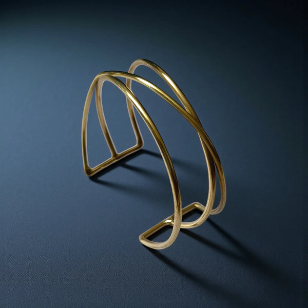 Sculpted silhouette gives this anti-tarnish brass cuff its refined shape.