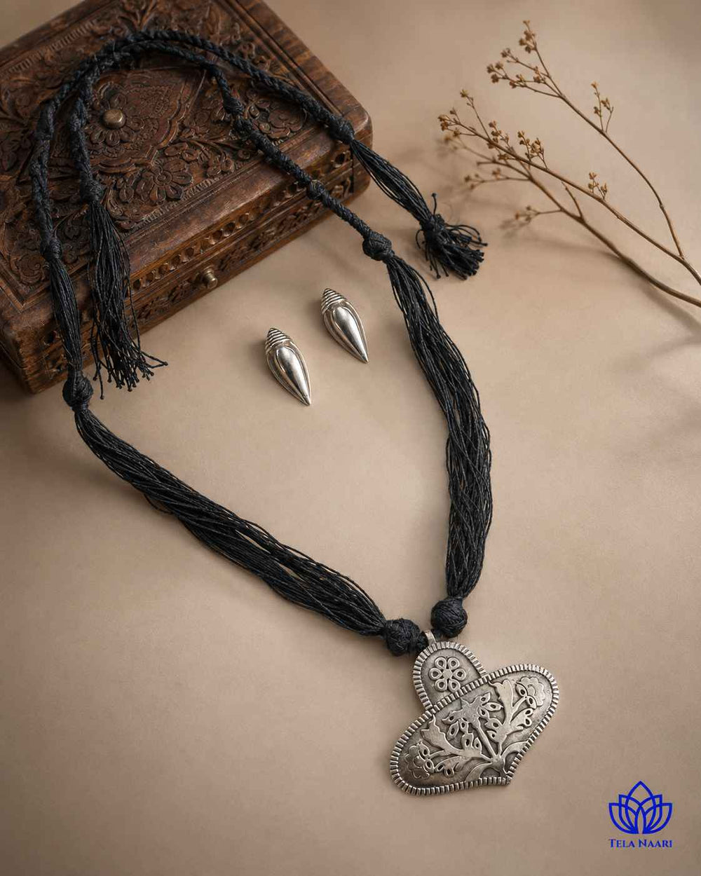 Silver-plated finish covers the surface of this necklace.