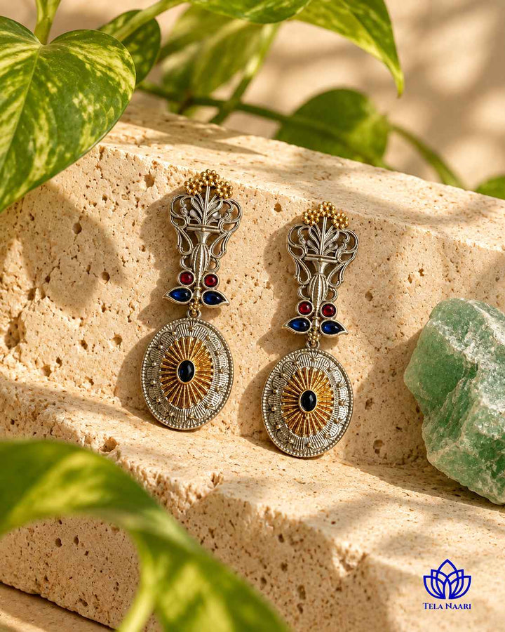 Silver-plated finish highlights the other half of this earring.