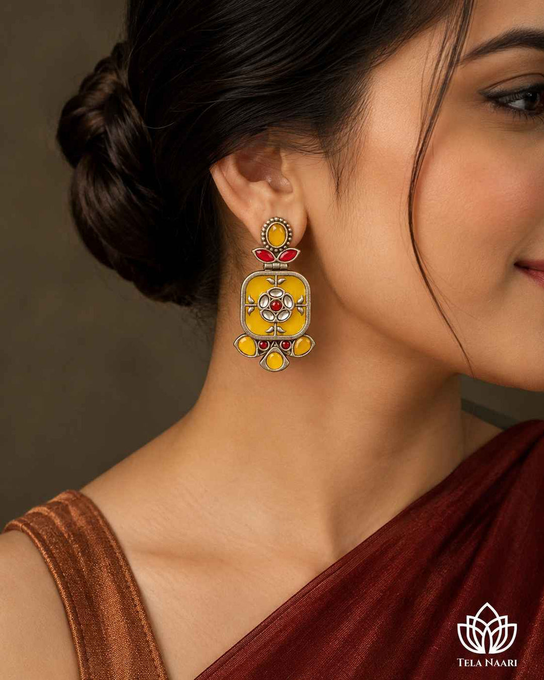 Casual Indian wear pairs effortlessly with this everyday yellow earring style.