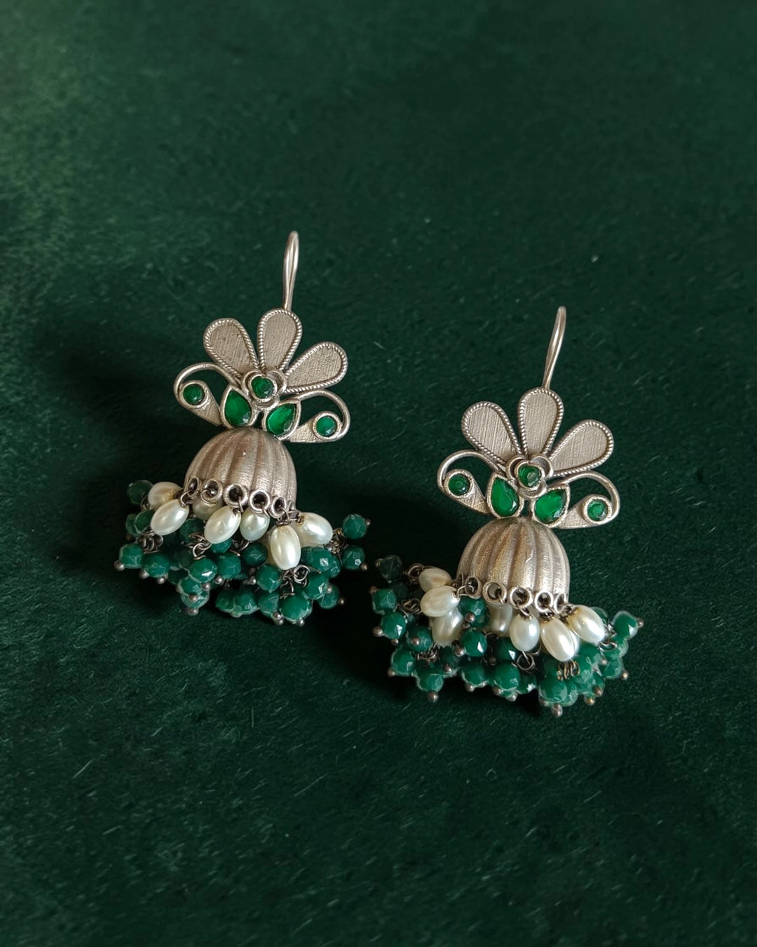 Traditional green beaded jhumka earrings flat lay – ethnic festive jewellery by TelaNaari