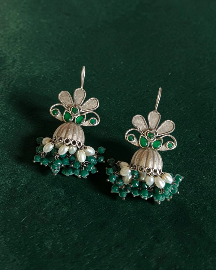 Traditional green beaded jhumka earrings flat lay – ethnic festive jewellery by TelaNaari