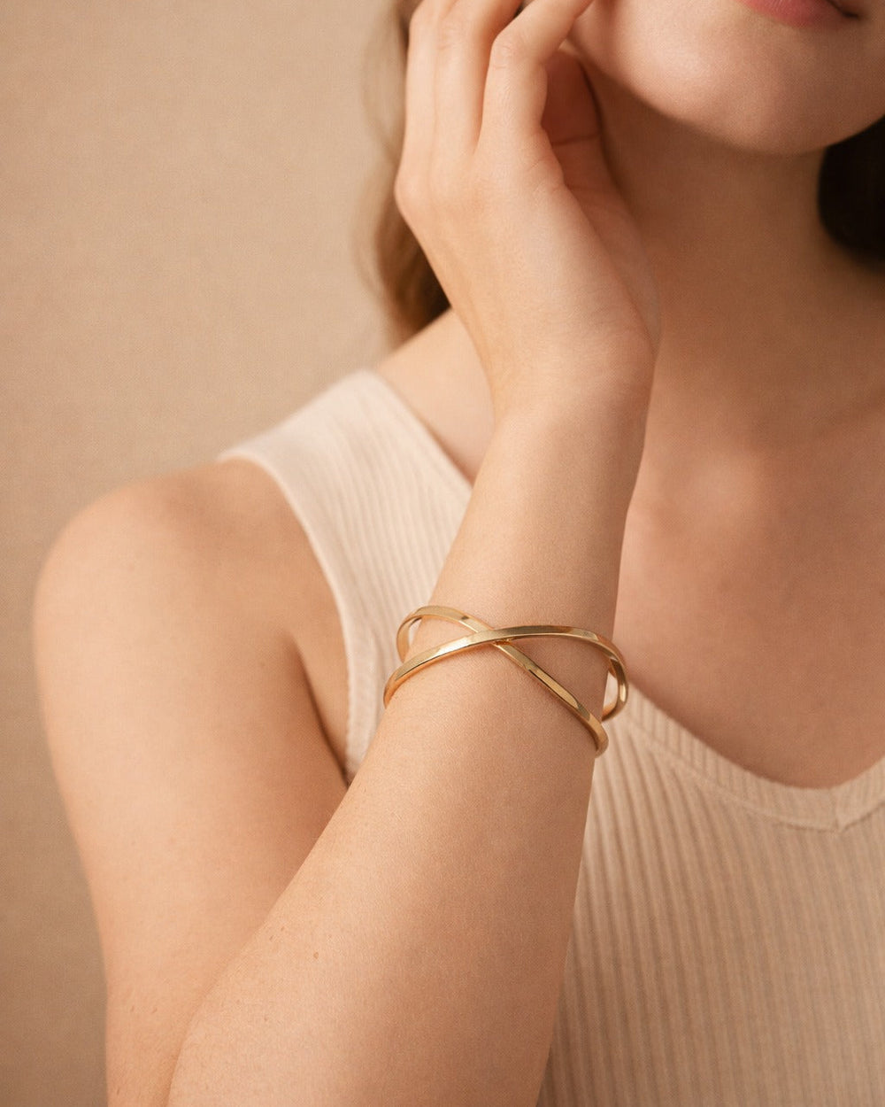 Brass construction supports the coated finish of this open cuff.
