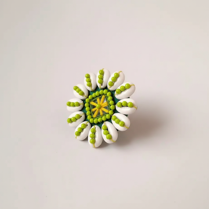 Square product photo of cowrie shell ring