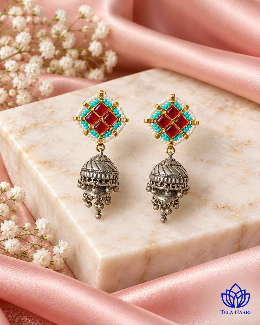Substantial 25g build gives this jhumka its statement presence.