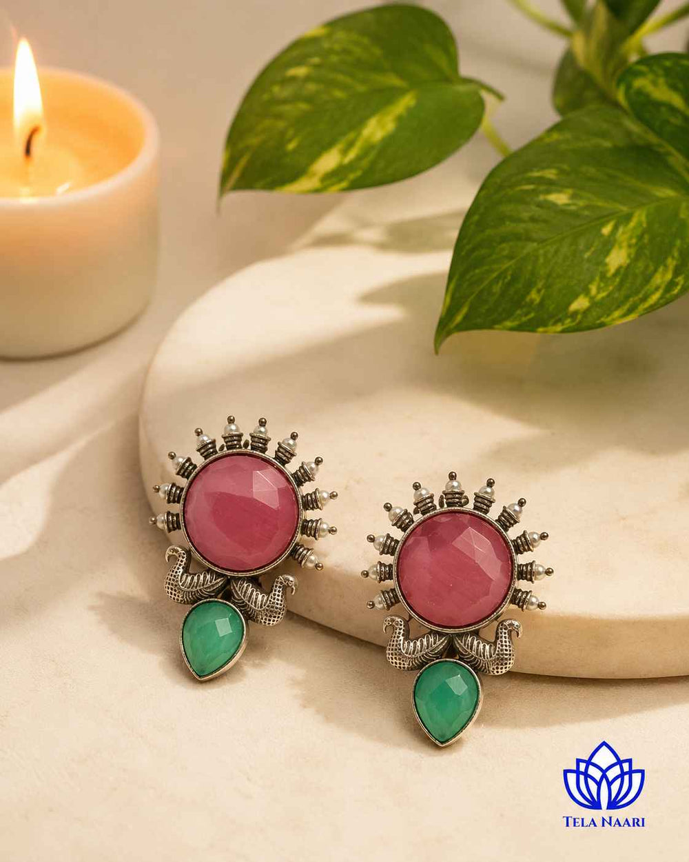Oxidised silver-plated alloy gives this earring a textured antique finish.