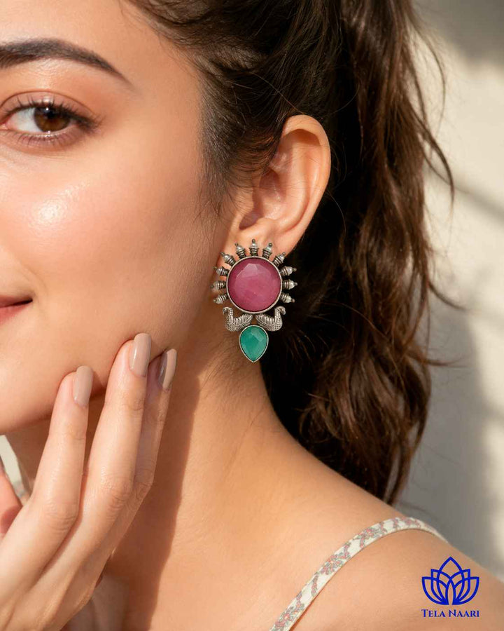 Celestial sunburst pattern radiates outward across the earring&