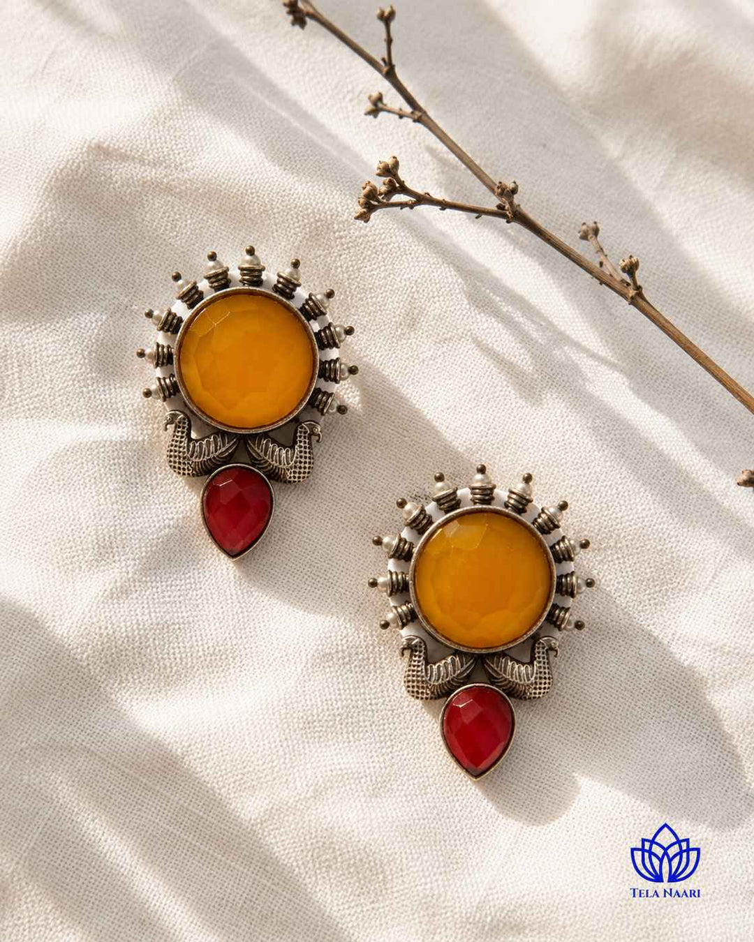 Festive detailing highlights the sunburst silhouette in yellow tones.
