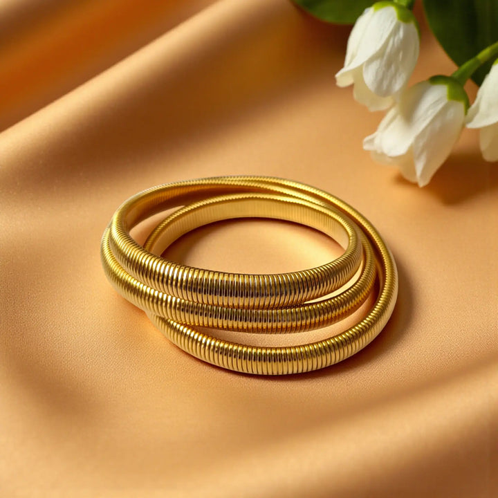 Tarnish-free coil bangle bracelet set for women featuring elegant coiled design and glossy gold finish
