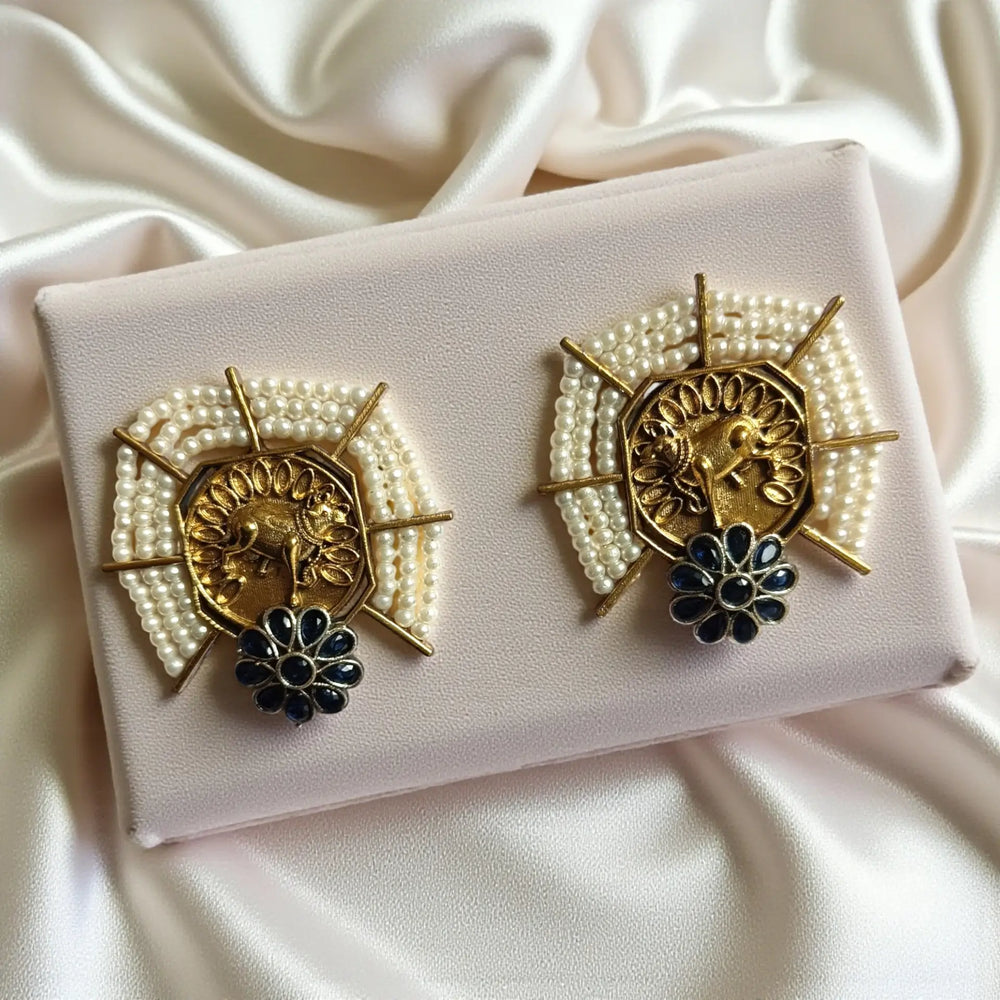 Elegant Ishmita dual tone silver plated stud earrings in blue by Tela Naari – ideal for office wear or everyday elegance
