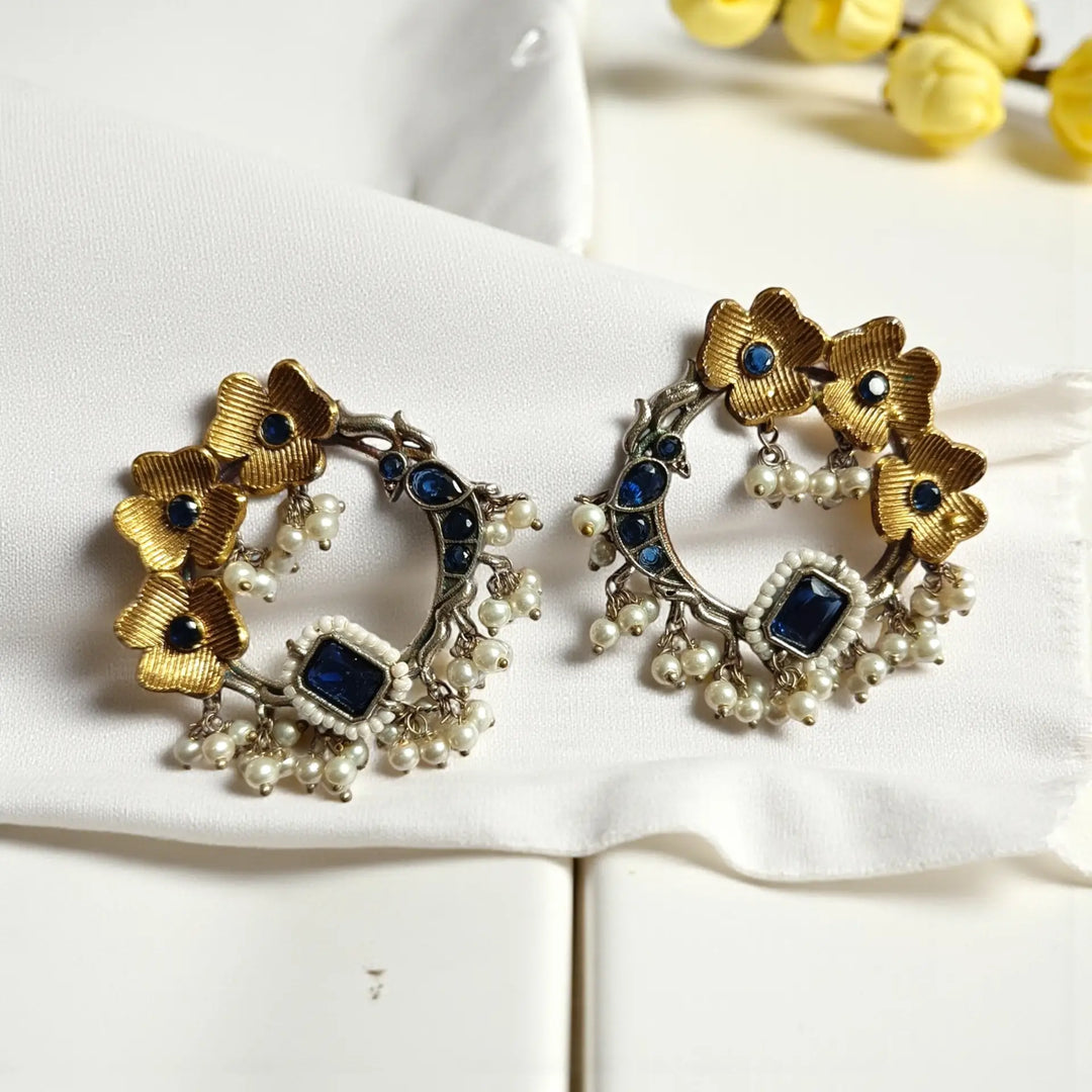 Elegant Ishwika dual tone silver plated stud earrings in blue by Tela Naari – ideal for office & everyday elegance
