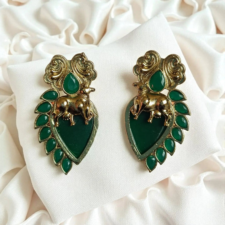 Bhuana dual tone stud earrings in green — rich tones for haldi, mehendi, and bold colorful celebrations.
