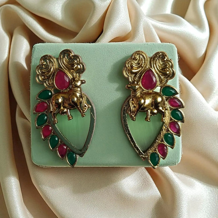 Bhuana dual tone stud earrings in light green — ideal for daytime celebrations, spring events, and refreshing ethnic style.

