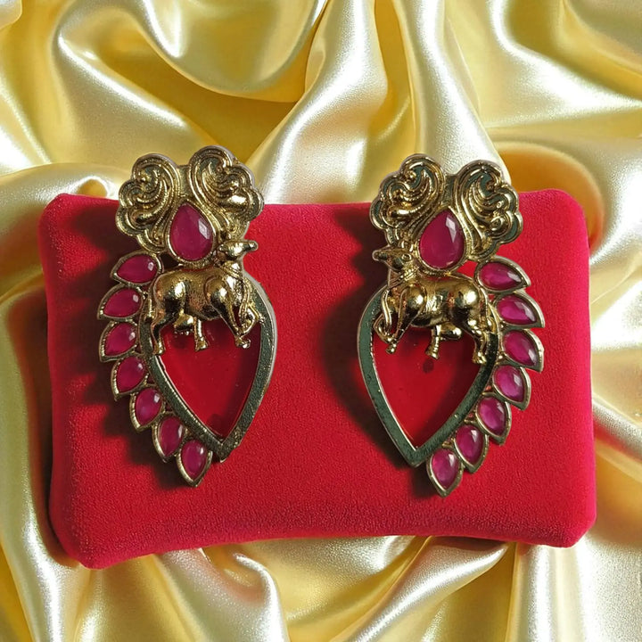 Bhuana dual tone stud earrings in red — perfect for festive pujas, wedding receptions, and bold traditional looks.
