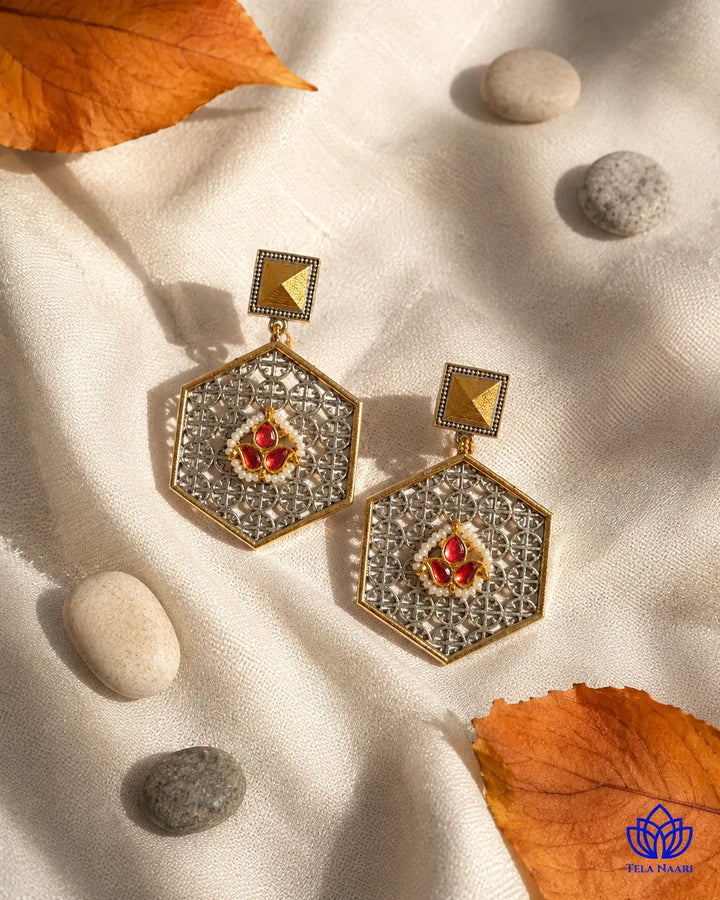Dual-tone plating covers the surface of this hexagon earring.