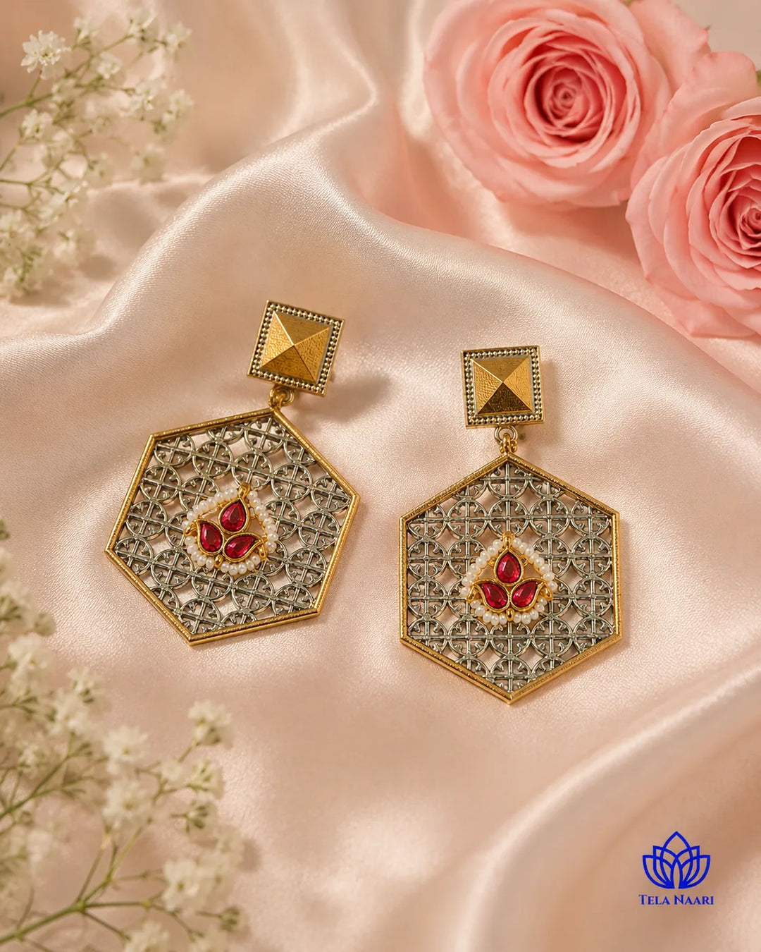 Geometric hexagon silhouette anchors the design of this earring.