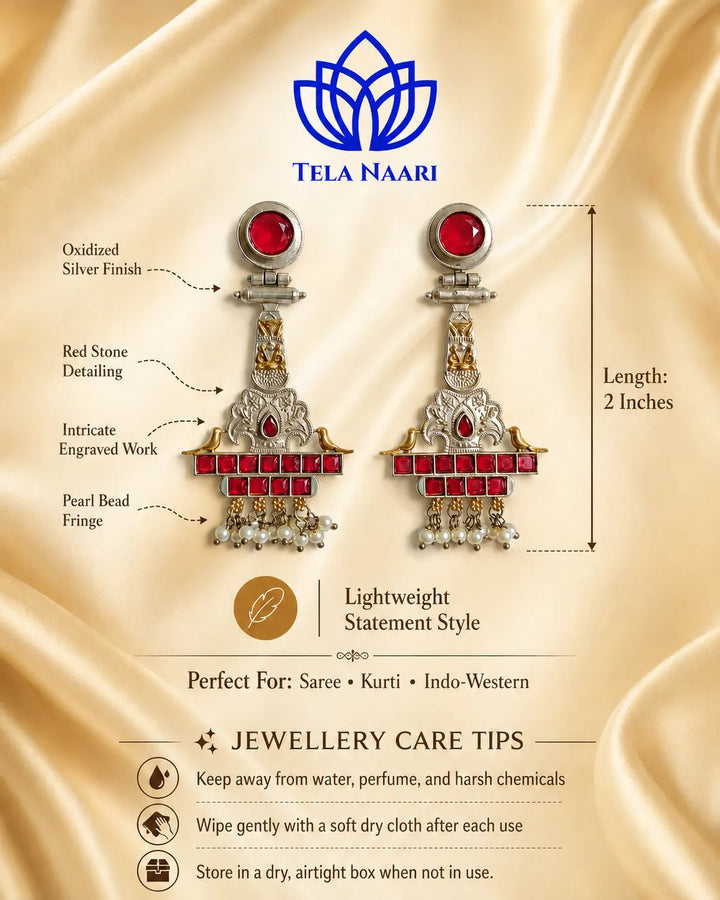 Silver-plated finish covers the surface of this temple earring.