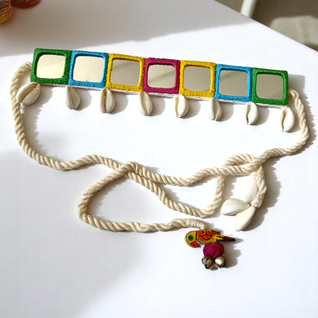 Colourful fabric forms the base of this vibrant handmade choker.