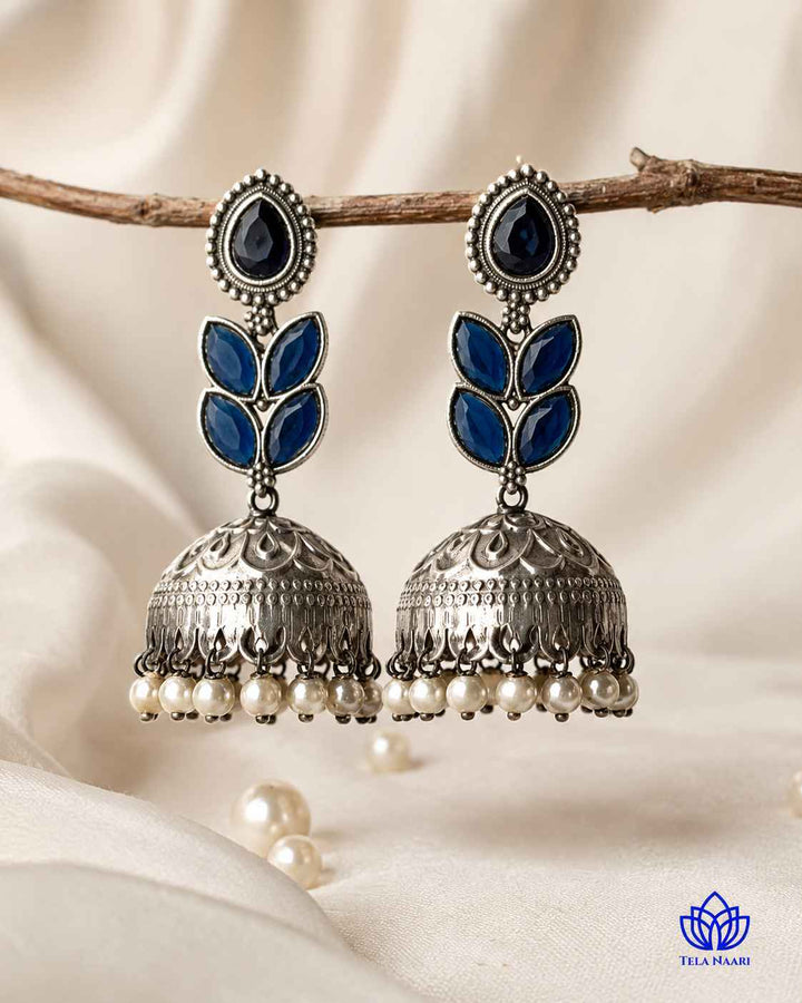 Silver-plated finish gives this jhumka a smooth, polished shine.