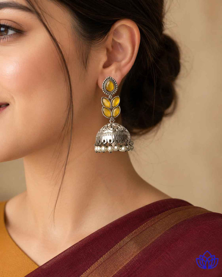Silver-plated finish covers the brass base of this teardrop earring.