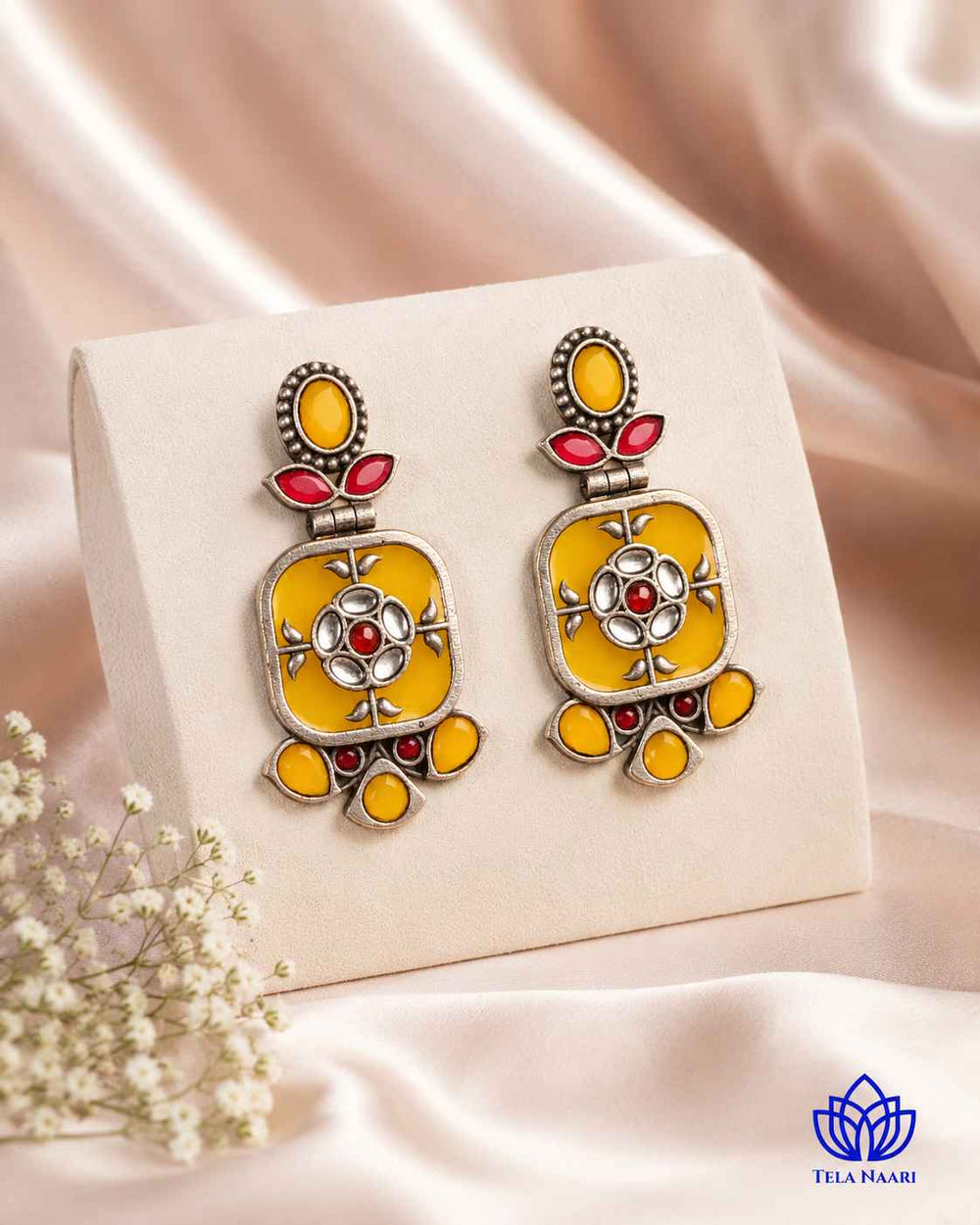 Free-moving design gives this dangler earring an easy-swing, playful silhouette.