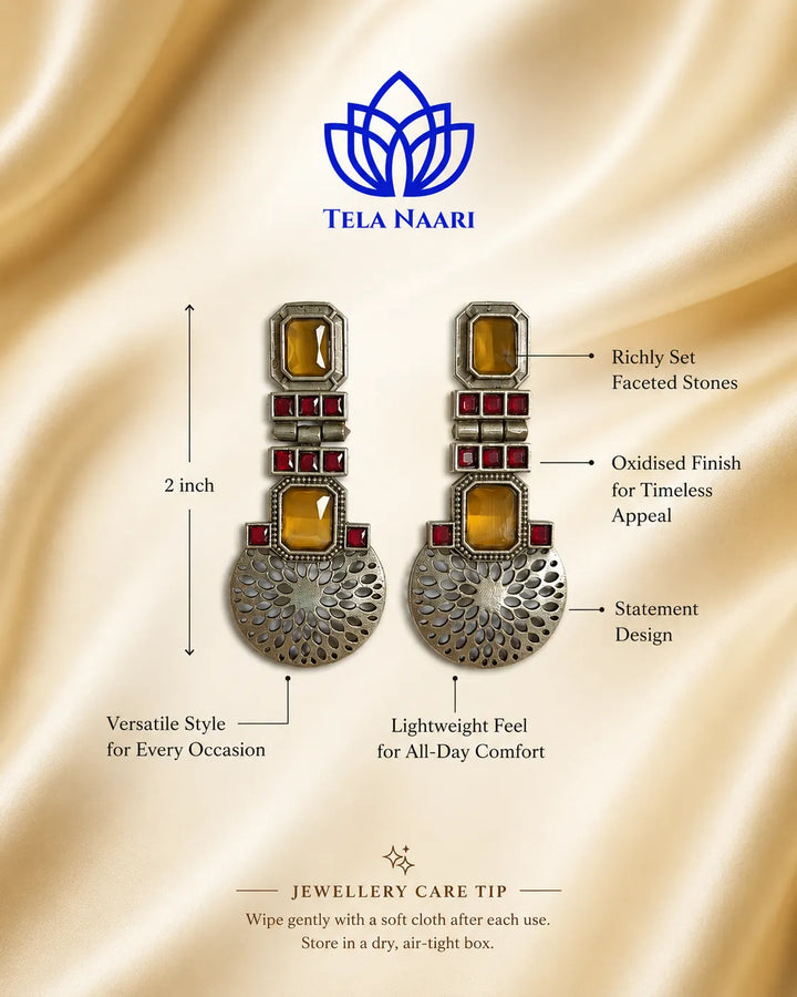 Intricate detailing highlights the contemporary silhouette of this earring.