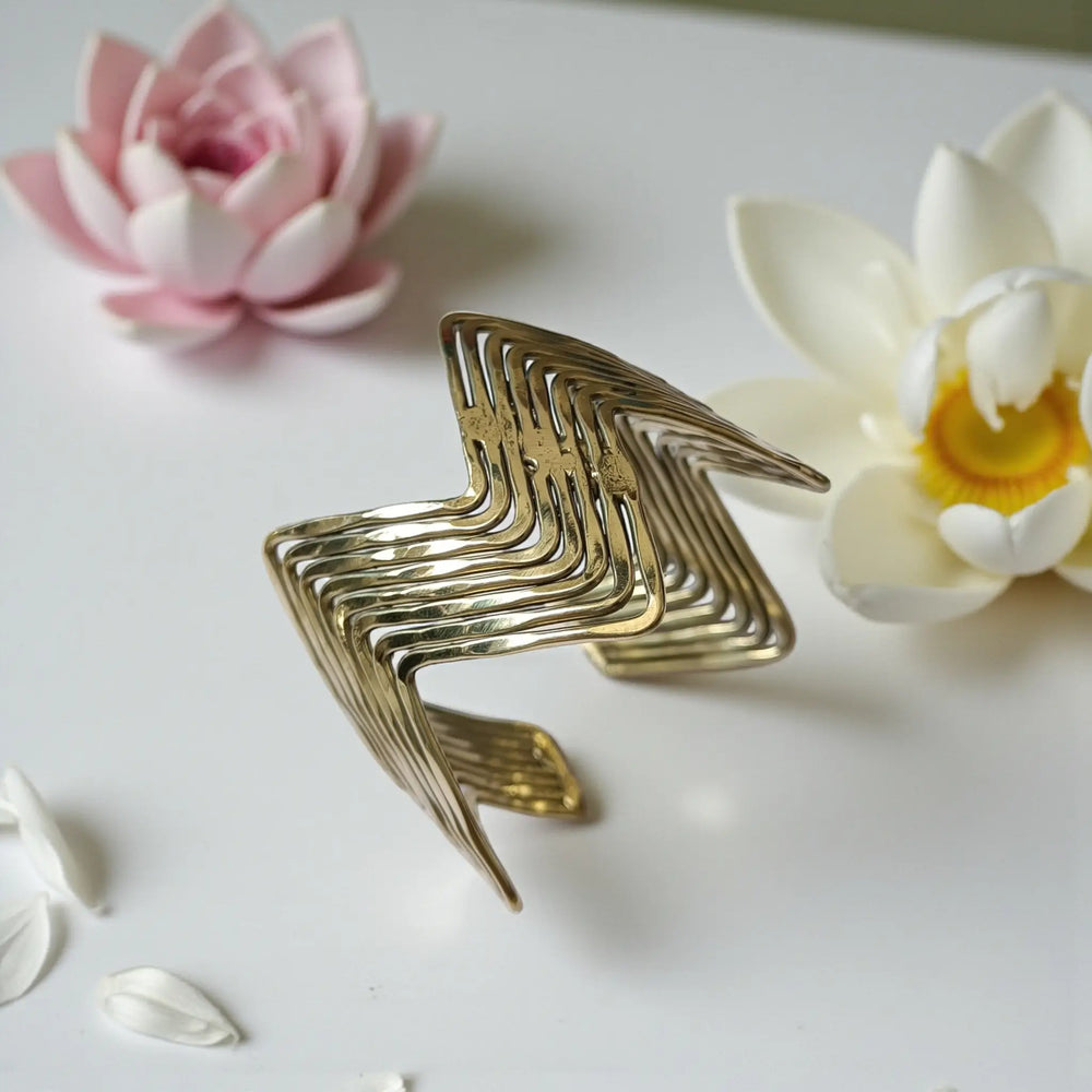 Bold zigzag anti-tarnish hand bracelet for women with modern sculptural detailing and polished brass texture
